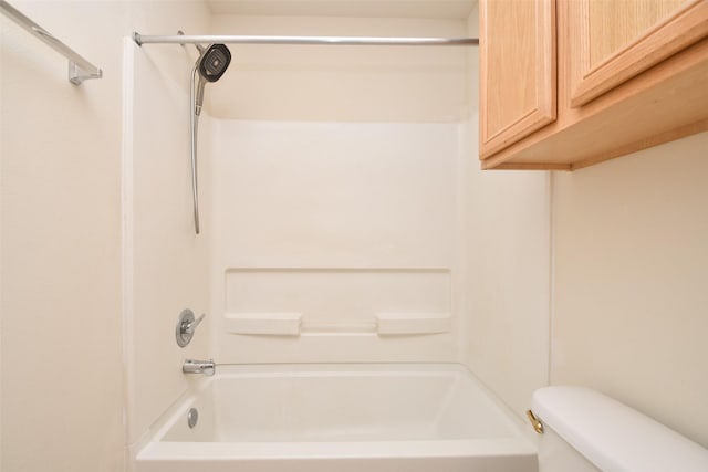 bathroom featuring  shower combination and toilet