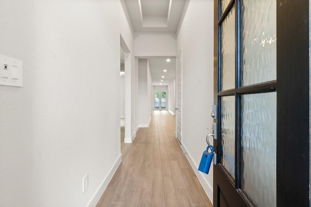 hall with light wood-type flooring