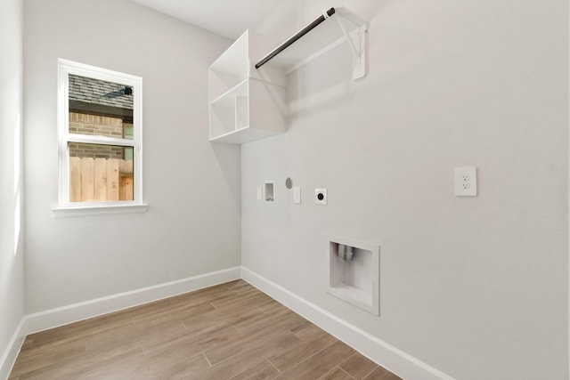 laundry room featuring hookup for a gas dryer, electric dryer hookup, washer hookup, and light wood-type flooring