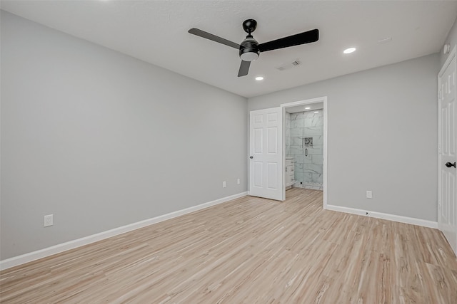 unfurnished bedroom featuring ceiling fan, connected bathroom, and light hardwood / wood-style floors