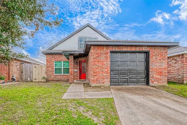 view of front of home with a garage, a front yard, brick siding, and driveway