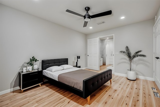 bedroom featuring recessed lighting, visible vents, light wood-type flooring, and baseboards