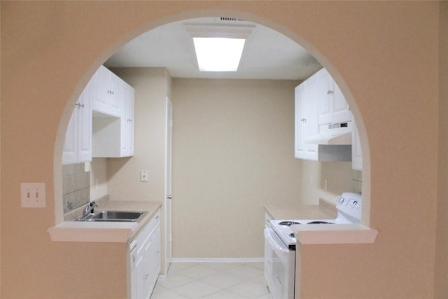 kitchen with white cabinetry, white electric range, and sink