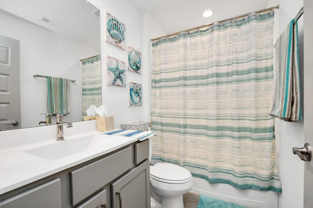 full bathroom featuring vanity, toilet, and shower / bath combo with shower curtain