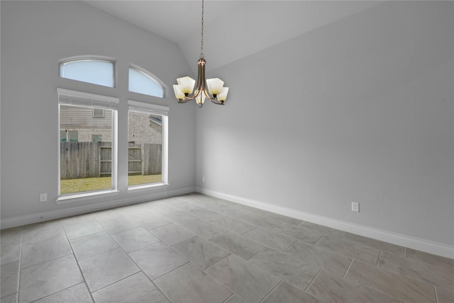 unfurnished room with vaulted ceiling, light tile patterned floors, and a chandelier