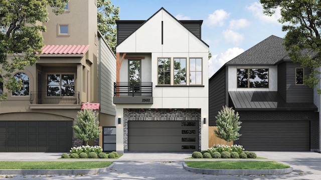 view of front of property featuring a garage and a balcony