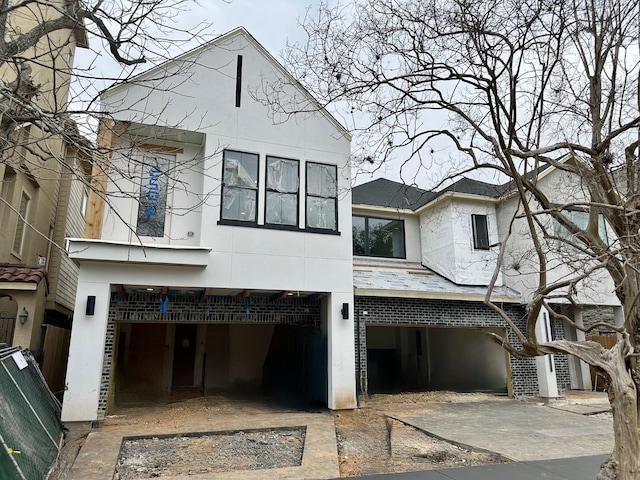 view of front of property with a garage