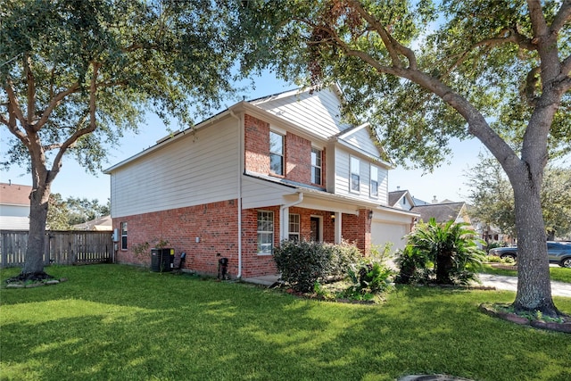 view of side of home featuring central AC, fence, a lawn, and brick siding