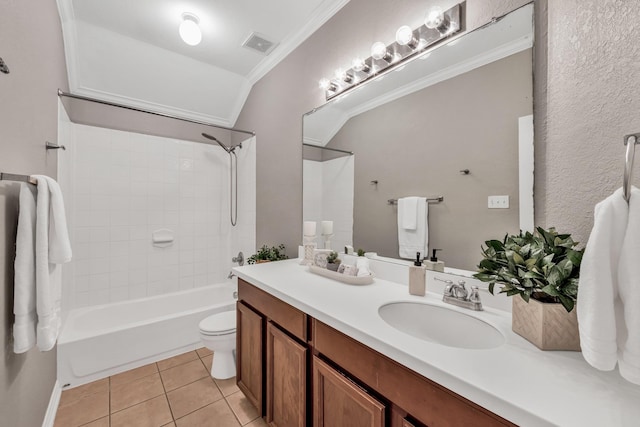 full bathroom featuring bathing tub / shower combination, vanity, toilet, crown molding, and tile patterned floors