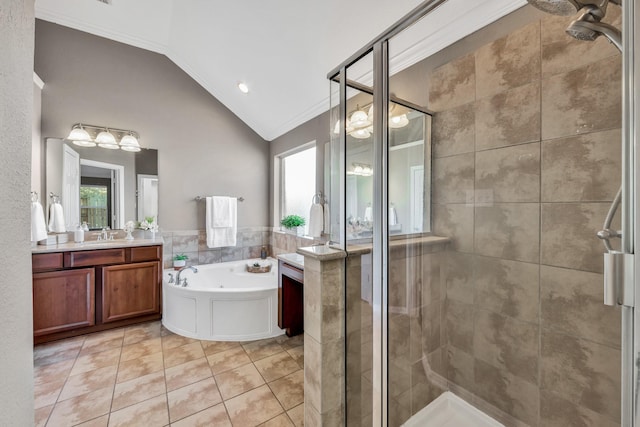 bathroom featuring plus walk in shower, lofted ceiling, vanity, crown molding, and tile patterned floors