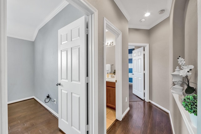 hall with crown molding and dark hardwood / wood-style floors