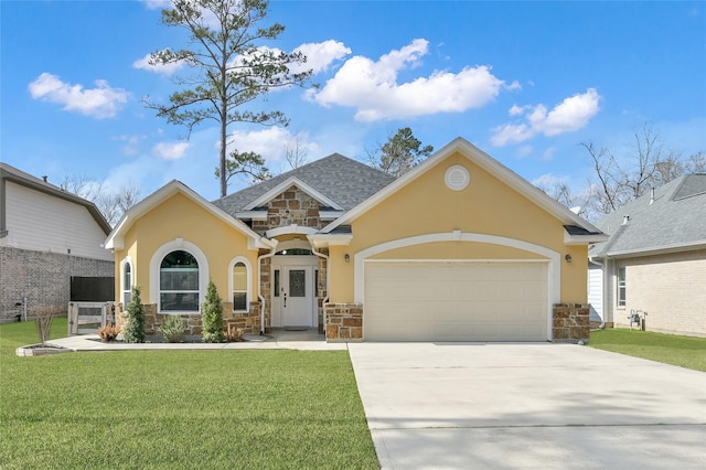 view of front of home featuring a garage and a front lawn