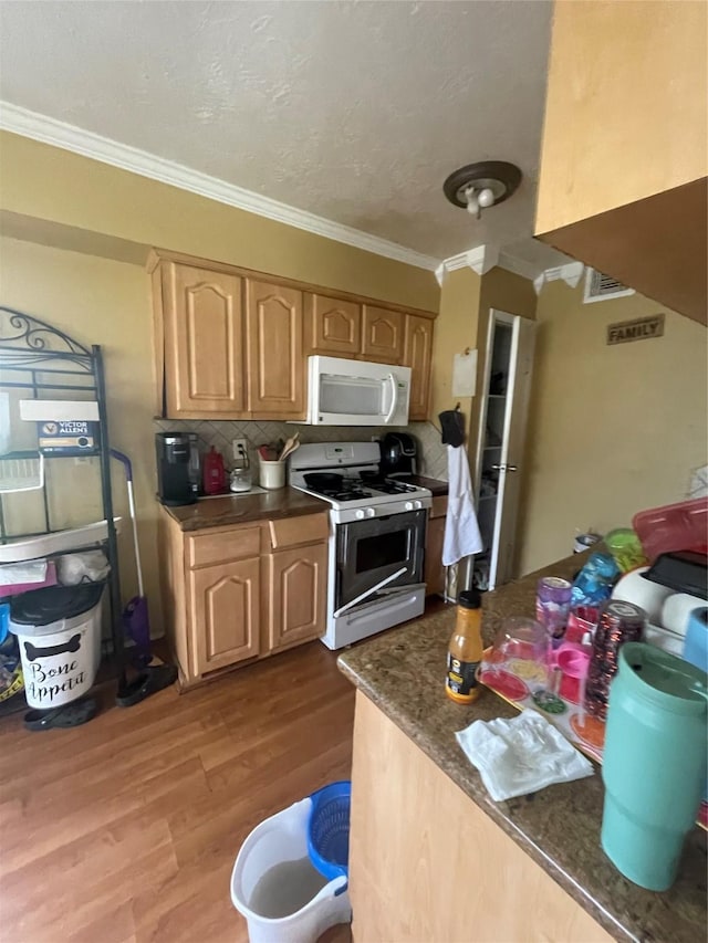 kitchen featuring light brown cabinetry, white appliances, light hardwood / wood-style flooring, and crown molding