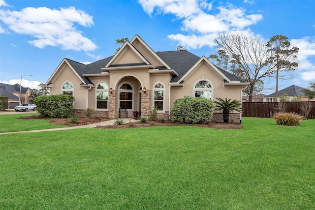 view of front of house with a front lawn