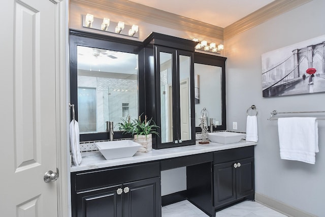 bathroom featuring crown molding, vanity, and a shower with shower door