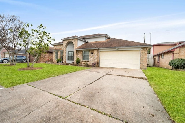 view of front of house with a garage and a front yard