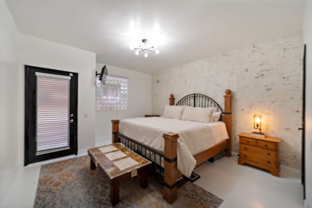 bedroom with a notable chandelier