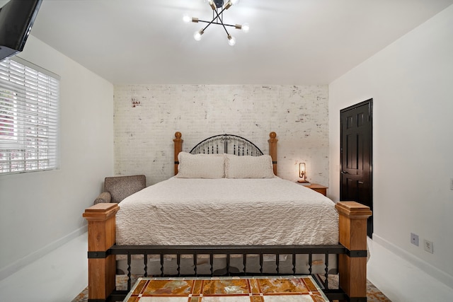 bedroom with a notable chandelier