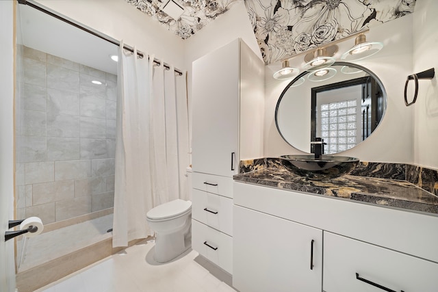 bathroom with a shower with curtain, vanity, and toilet