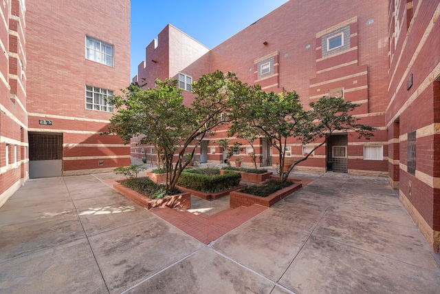 view of home's community featuring a patio area