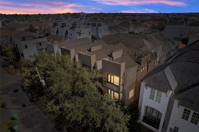 aerial view at dusk with a residential view