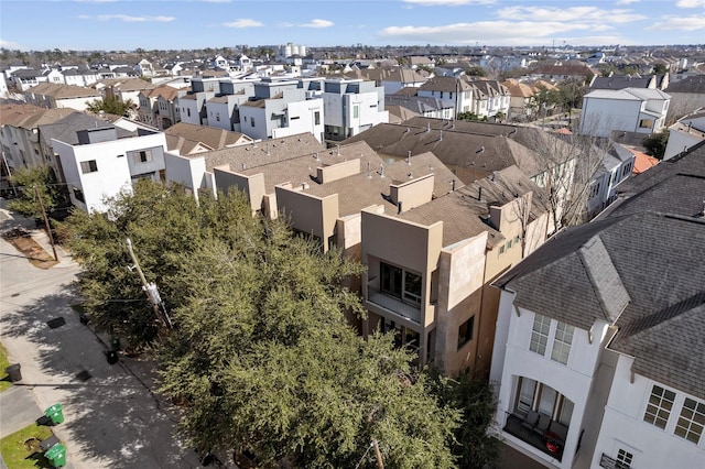 birds eye view of property with a residential view