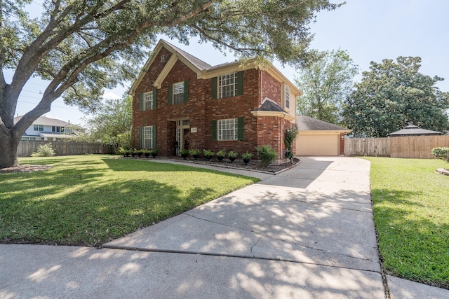 view of front facade featuring a garage and a front yard