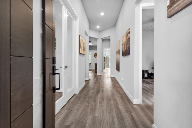 corridor featuring light wood-type flooring