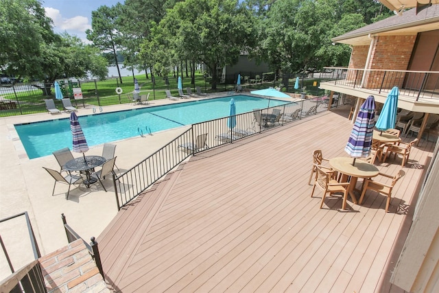 view of swimming pool featuring a patio