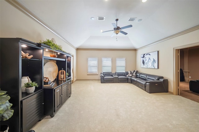 carpeted living room featuring lofted ceiling, visible vents, and crown molding