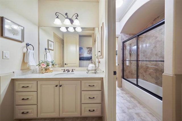 full bathroom with shower / bath combination with glass door, vanity, and tile patterned floors