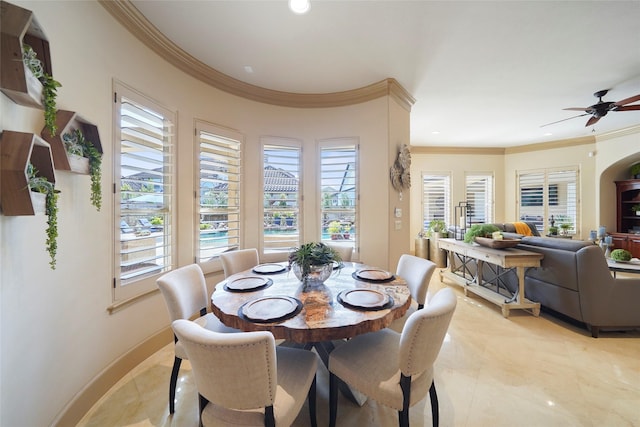 dining space featuring recessed lighting, crown molding, baseboards, and ceiling fan