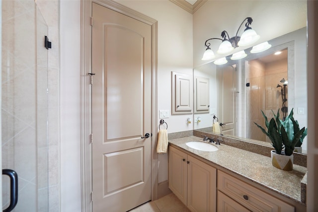 bathroom featuring a stall shower, tile patterned floors, and vanity