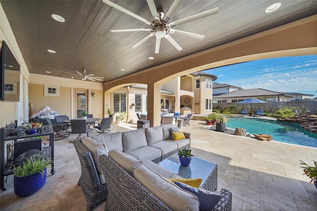 view of patio / terrace featuring a fenced in pool, outdoor dining area, outdoor lounge area, a ceiling fan, and fence