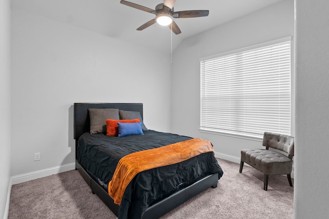 bedroom with vaulted ceiling, carpet, and ceiling fan