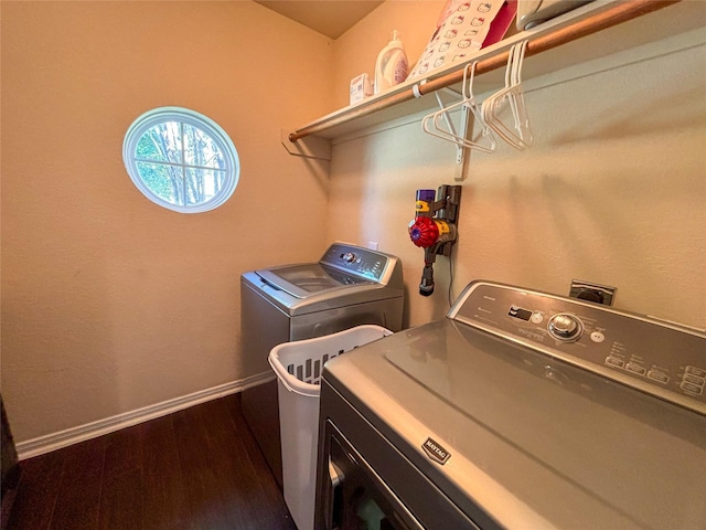 washroom featuring hardwood / wood-style floors and independent washer and dryer