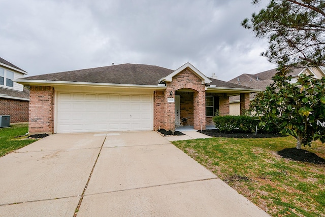 single story home featuring central AC unit, a garage, and a front yard