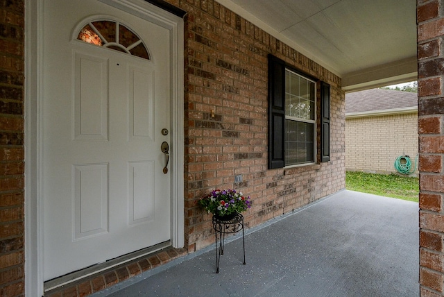 entrance to property with a porch