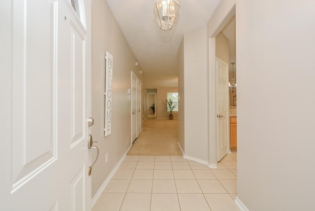 hallway with light tile patterned floors