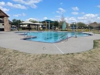 view of swimming pool with a gazebo and a patio