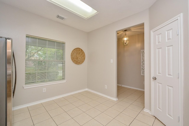 view of tiled empty room