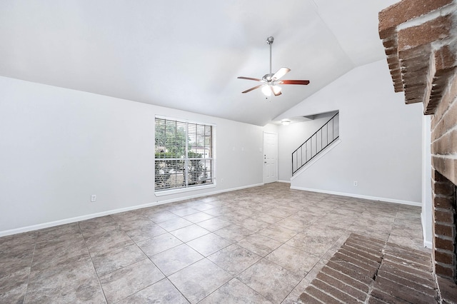 unfurnished living room featuring vaulted ceiling and ceiling fan