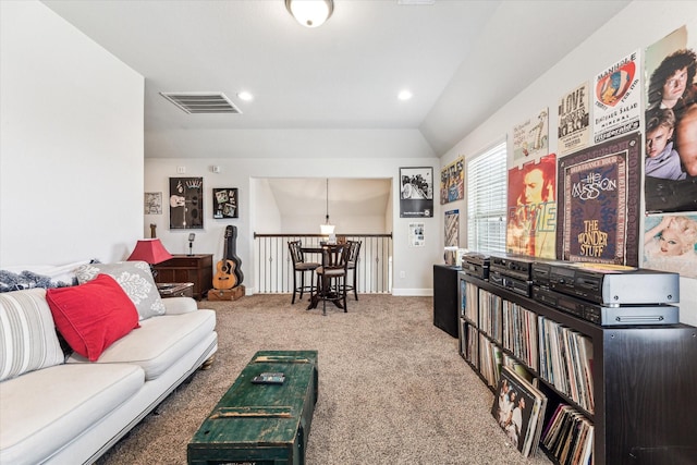 living room featuring baseboards, visible vents, vaulted ceiling, carpet flooring, and recessed lighting