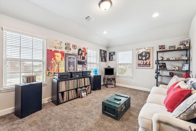 living room featuring carpet, visible vents, baseboards, and recessed lighting