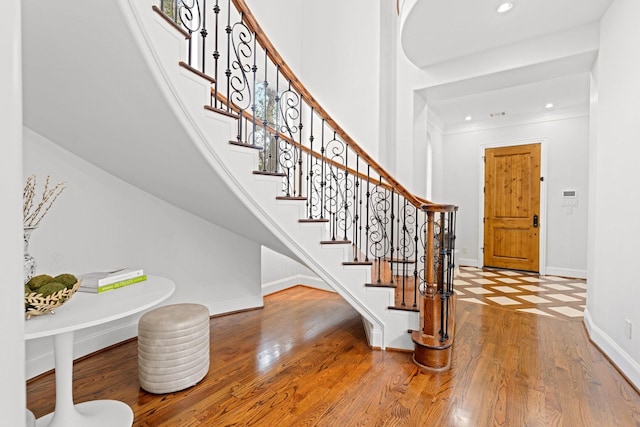 entryway with wood-type flooring