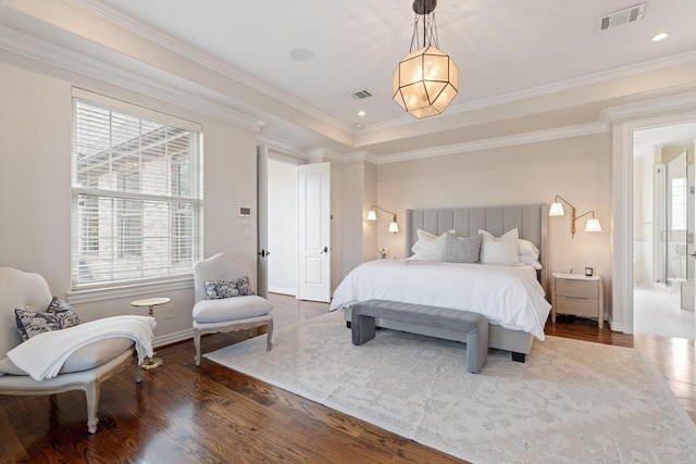 bedroom with ornamental molding and wood-type flooring