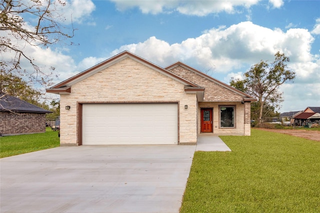 view of front of home with a garage and a front lawn