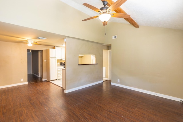 unfurnished living room featuring ceiling fan, dark hardwood / wood-style flooring, high vaulted ceiling, and beam ceiling