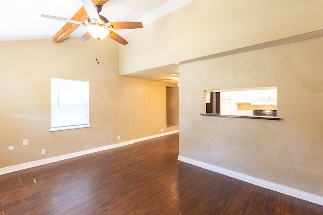 spare room featuring hardwood / wood-style floors, beam ceiling, high vaulted ceiling, and ceiling fan