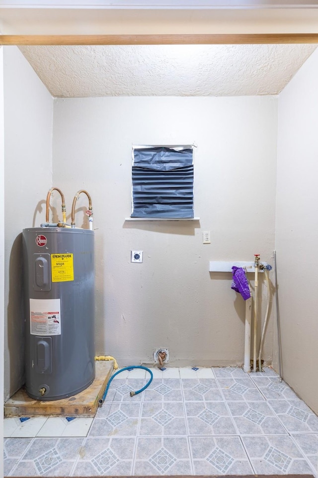 utility room featuring water heater